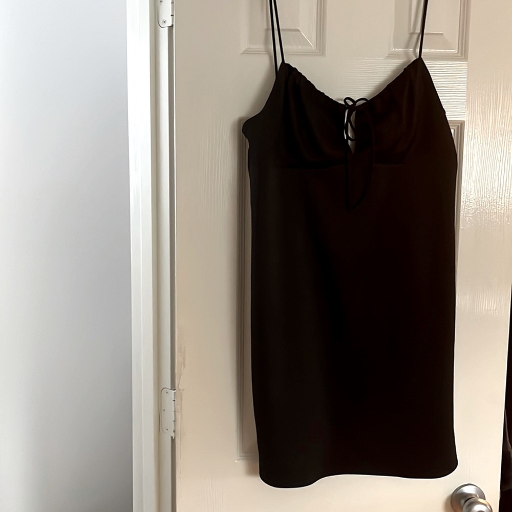 Black mini dress from Nieman Marcus size 8 but fits like a size 6